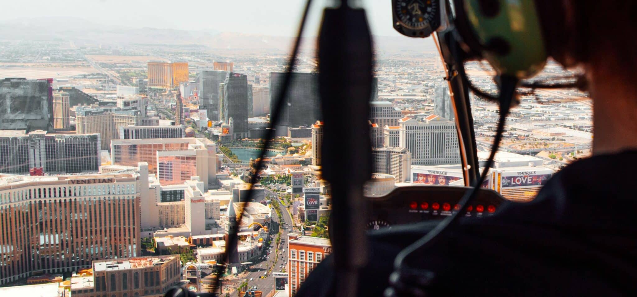 looking over the shoulder of a helicopter pilot at Las Vegas on a helicopter tour