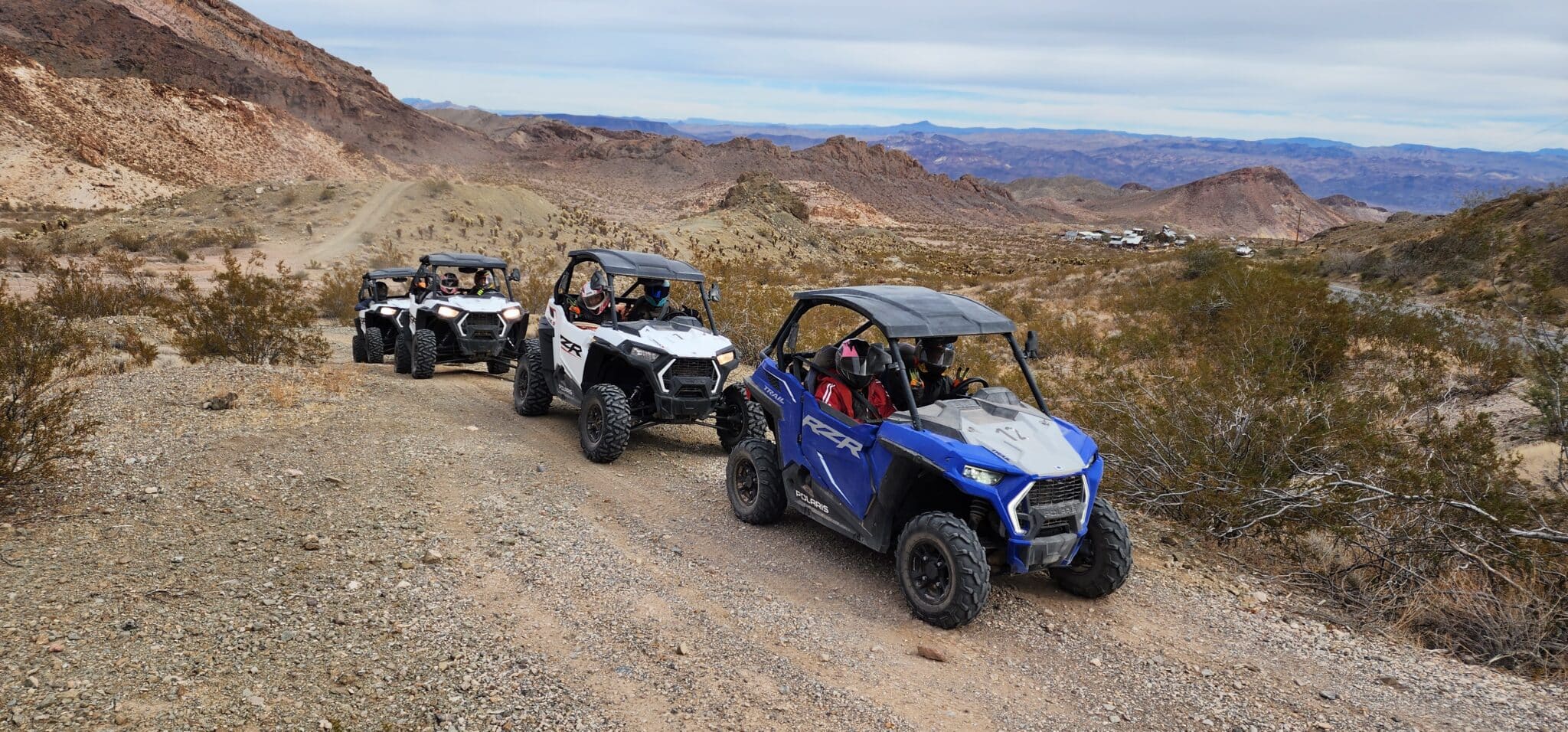 people riding Polaris RZRs on a Las Vegas ATV/RZR Tour
